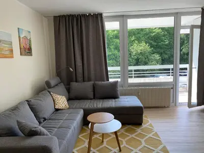 Ein Sitzbereich in der Unterkunft Lichtdurchflutetes Apartment mit Blick ins Grüne