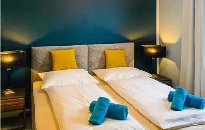 Ein Bett oder Betten in einem Zimmer der Unterkunft Nice Apartment In Mettmann With Wifi
