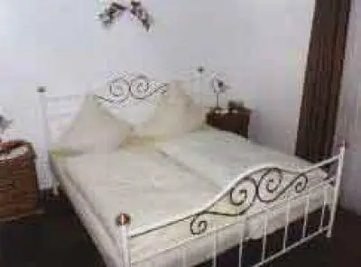 Ein Bett oder Betten in einem Zimmer der Unterkunft Kämpgens – Hof