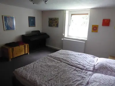 Ein Bett oder Betten in einem Zimmer der Unterkunft Ferienwohnung Bochum-Eppendorf