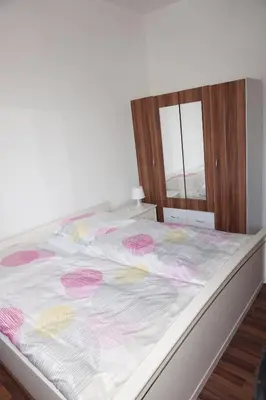 Ein Bett oder Betten in einem Zimmer der Unterkunft Artus Hotel