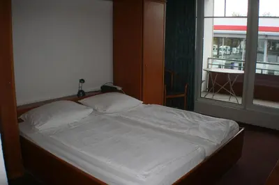 Ein Bett oder Betten in einem Zimmer der Unterkunft Bittscheidt´s Stadthotel