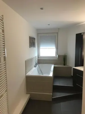 Ein Bett oder Betten in einem Zimmer der Unterkunft Ferienwohnung kleines Zuhause