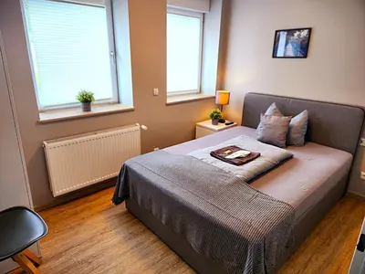 Ein Bett oder Betten in einem Zimmer der Unterkunft Stadt Apartments Solingen