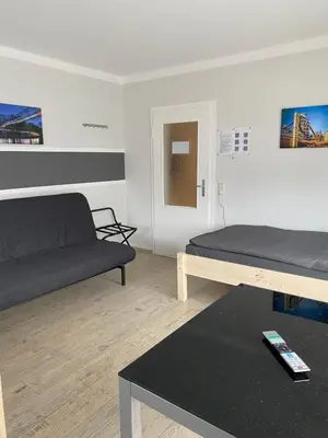 Ein Bett oder Betten in einem Zimmer der Unterkunft Ferienwohnung Hagen