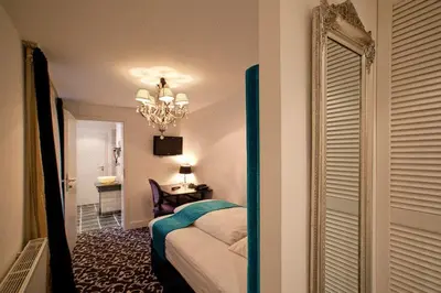 Ein Bett oder Betten in einem Zimmer der Unterkunft Hotel Aleksandra