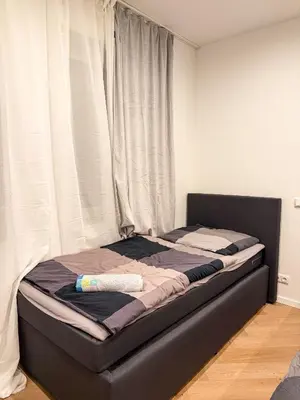 Ein Bett oder Betten in einem Zimmer der Unterkunft Ruhr Business Apartments Essen Apartment mit 5 Einzelbetten Privat Parkplatz
