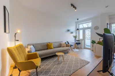 Ein Sitzbereich in der Unterkunft Glück Auf Appartements Hufelandstraße Essen
