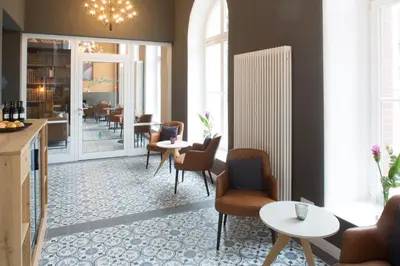 Ein Sitzbereich in der Unterkunft Weberei Bendix Hotel & Appartements