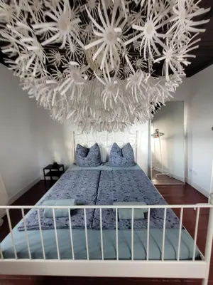 Ein Bett oder Betten in einem Zimmer der Unterkunft Get-your-flat - Wohnen im Eulenturm tiny owl-house - naturnah & einzigartig - 60 m2 - Haustier auf Anfrage OG1