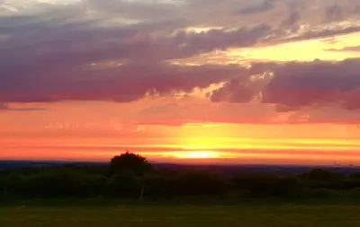 Blick auf den Sonnenuntergang/Sonnenaufgang von der Ferienwohnung aus oder aus der Nähe