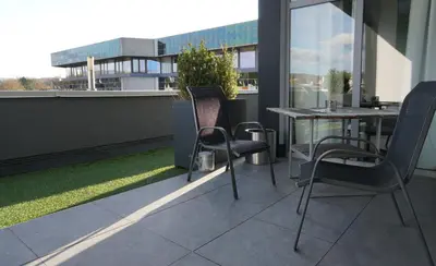 Ein Balkon oder eine Terrasse in der Unterkunft Hotel Come In