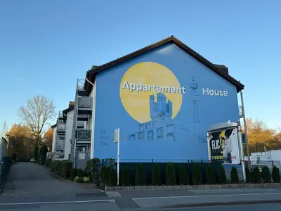 Ein Zertifikat, Auszeichnung, Logo oder anderes Dokument, das in der Unterkunft Appartement House Dortmund 