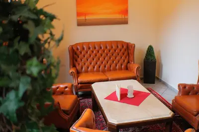 Ein Sitzbereich in der Unterkunft Avantgarde Hotel