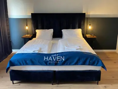 Ein Bett oder Betten in einem Zimmer der Unterkunft Haven Hotel - Wuppertal