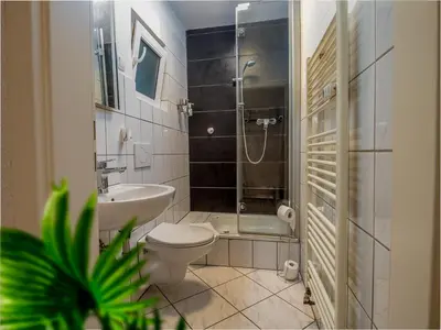 Ein Badezimmer in der Unterkunft Tiny House in Duisburg by JUNIK Apartments