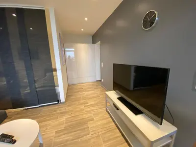 TV/Unterhaltungsangebot in der Unterkunft Modernes Apartment Duisburg Homberg