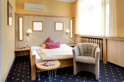 Ein Sitzbereich in der Unterkunft Ambient Hotel Zum Schwan