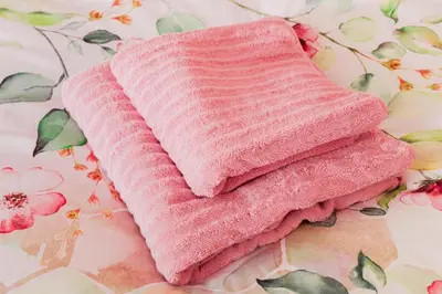 Ein Bett oder Betten in einem Zimmer der Unterkunft Ferienwohnungen Margot