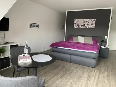 Ein Bett oder Betten in einem Zimmer der Unterkunft City-Apartment Dülmen