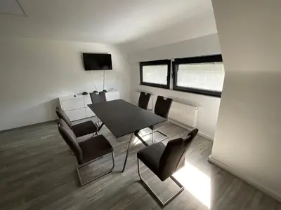 Ein Sitzbereich in der Unterkunft Warzalas Apartement
