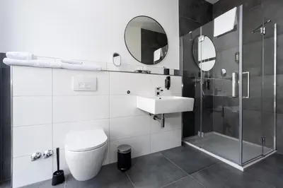 Ein Badezimmer in der Unterkunft Hotel Deluxe