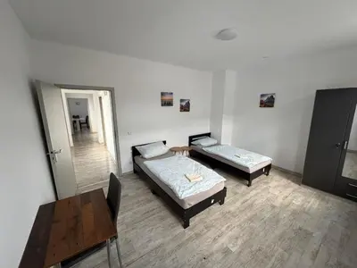 Ein Bett oder Betten in einem Zimmer der Unterkunft Boarding House Hagen