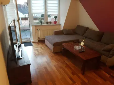 Ein Sitzbereich in der Unterkunft Ferienwohnung Calabria Nr 3