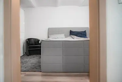 Ein Bett oder Betten in einem Zimmer der Unterkunft Düsseldorfer Apartment am See