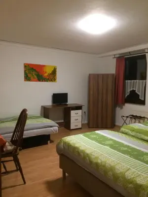 Ein Bett oder Betten in einem Zimmer der Unterkunft Abels Appartements