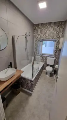 Ein Badezimmer in der Unterkunft FeWo Resse