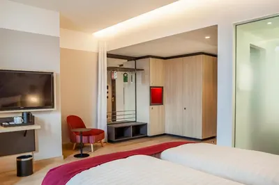 Ein Bett oder Betten in einem Zimmer der Unterkunft IntercityHotel Dortmund