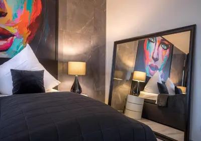 Ein Bett oder Betten in einem Zimmer der Unterkunft RüSuite III - Gemütliches Apartment in Essen