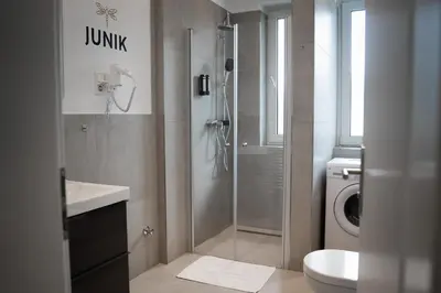 Ein Badezimmer in der Unterkunft JUNIK Apartments Oberhausen