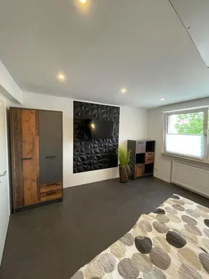 Ein Bett oder Betten in einem Zimmer der Unterkunft My Home Deluxe Ferienwohnung Sauna