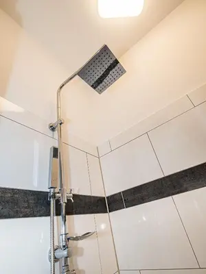 Ein Badezimmer in der Unterkunft Moderne Apartments City Stadtnah -JUNIK Apartments