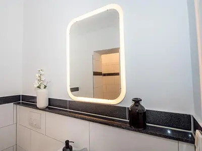 Ein Badezimmer in der Unterkunft Moderne Apartments City Stadtnah -JUNIK Apartments
