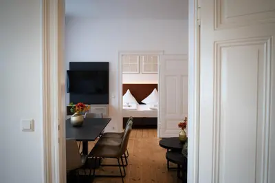 Ein Bett oder Betten in einem Zimmer der Unterkunft Moderne Apartments City Stadtnah -JUNIK Apartments
