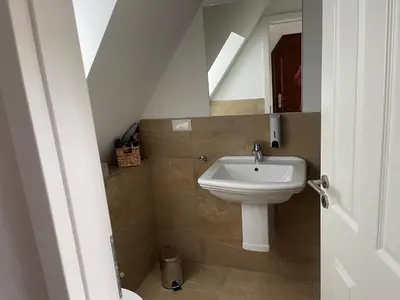 Ein Badezimmer in der Unterkunft Pension Ruhrfrosch
