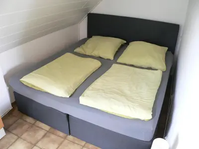Ein Bett oder Betten in einem Zimmer der Unterkunft Home24