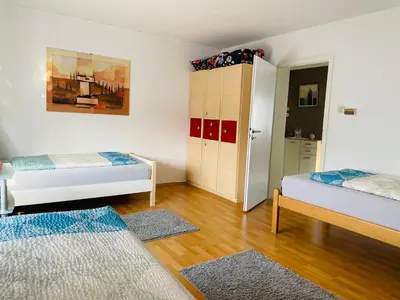 Ein Bett oder Betten in einem Zimmer der Unterkunft Bei Daniel am Dortmunder Flughafen