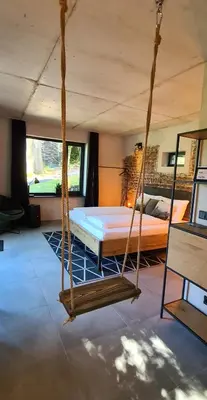 Ein Bett oder Betten in einem Zimmer der Unterkunft 1Step2AllNature Tinyhouse