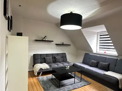 Ein Sitzbereich in der Unterkunft Duisburg FeelHome, Flughafen nah,2-Schlafzimmer, Badewanne, Zentral, WiFi, Top Floor