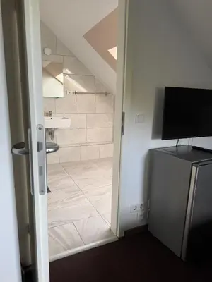 Ein Badezimmer in der Unterkunft Hotel Linda