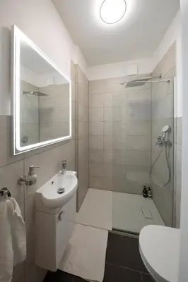 Ein Badezimmer in der Unterkunft JayBnB - Apartment direkt am Hafen mit Terrasse und UHD TV
