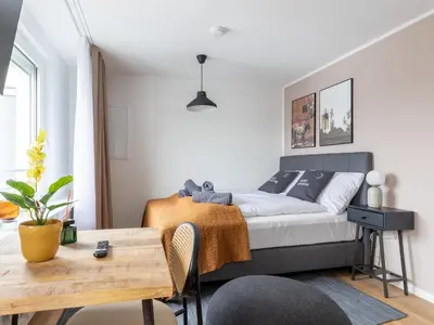 Ein Bett oder Betten in einem Zimmer der Unterkunft Limehome Essen Kettwiger Straße