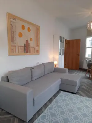 Ein Sitzbereich in der Unterkunft Ferienwohnung Langenberg Altstadt WiFi Netflix