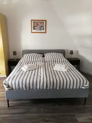Ein Bett oder Betten in einem Zimmer der Unterkunft Ferienwohnung Langenberg Altstadt WiFi Netflix
