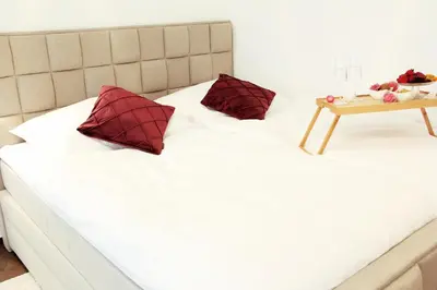 Ein Bett oder Betten in einem Zimmer der Unterkunft superior Apartment mit WiFi l 400m bis Uni l Messe l IGA 27 l Zoo Dui