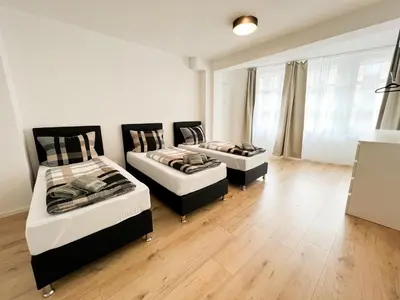 Ein Bett oder Betten in einem Zimmer der Unterkunft Centerapartments Premium DeLuxe